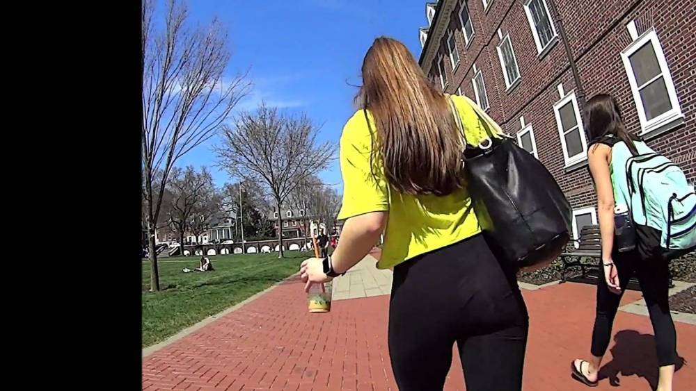 Brunette in Yellow Top and Black Leggings with Glasses - xh.video