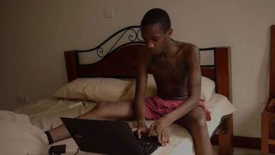 Inked Nubian twink wanks his oiled dick - nvdvid.com