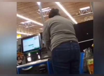 Sexy ass on brunnete milf in jeans at self checkout - voyeurhit.com