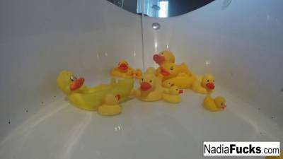 Nadia takes a bath with some rubber duckies - sexu.com