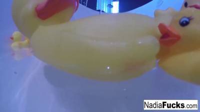 Nadia takes a bath with some rubber duckies - sexu.com