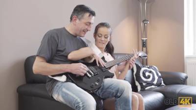 Petite cutie has fun with hard instrument belonging to old guitarist - pornoxo.com