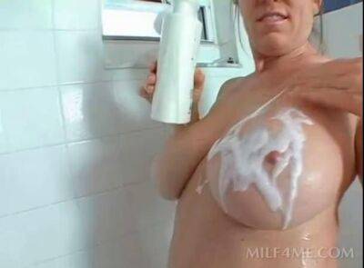 Busty horny mom rubbing her snatch in shower - sunporno.com