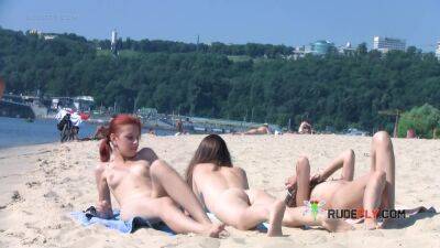 Wicked young nudist enjoys being topless at the beach - hclips.com