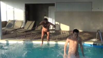 Four men at swimming pool - fetishpapa.com