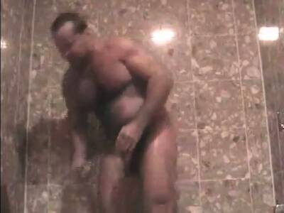 Hairy daddy gets blowjob from girl in the shower - nvdvid.com