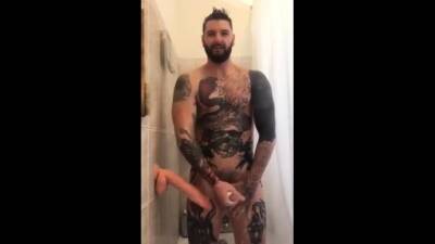 Tatted Hunk Fucks Dildo in Shower Until He Cums - drtuber.com