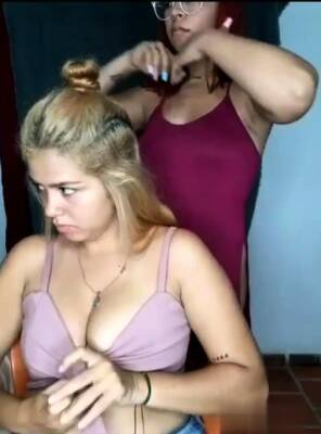 two female friends doing hairstyles and showing their bodies - icpvid.com
