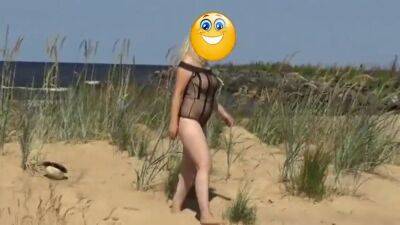 Pretty Woman In A Nylon Bodysuit On The Beach - hclips.com