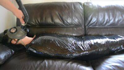 Plastic Mummification Girl With Gasmask - hclips.com