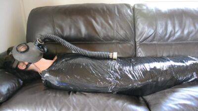 Plastic Mummification Girl With Gasmask - hclips.com