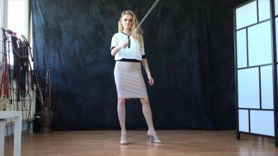 Hot blonde mistress wields her cane - upornia.com