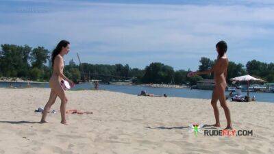 Petite nudist teen enjoys a beautiful day at the beach - hclips.com