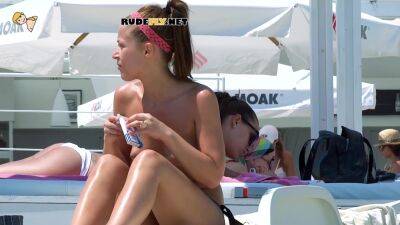 Skinny nudist teens loves being naked while sunbathing on the beach - hclips.com