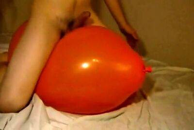 Big inflatable orange balloon humping cum - drtuber.com