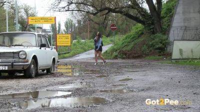 Brunette desperate for attention pisses in public river like a pro - sexu.com - Czech Republic