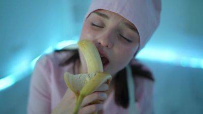 Young nurse and her banana - hclips.com