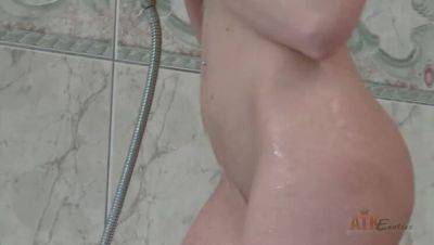 Cute Shaved Brunette in Shower - porntry.com