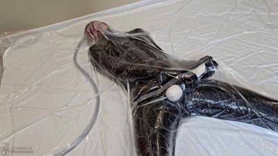 Dollified #2 - A Vacuum-sealed Latex Doll Getting Herself Off With A Magic Wand - upornia.com