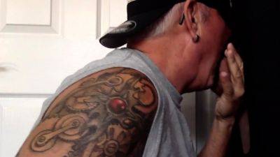 Inked gaydaddy slut sucks in gloryhole - drtuber.com